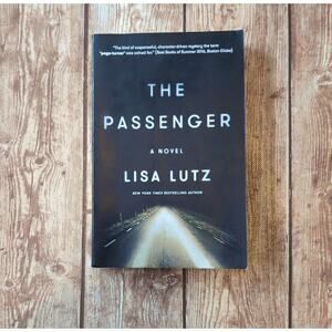 The Passenger A Novel by Lisa Lutz - Paperback Book